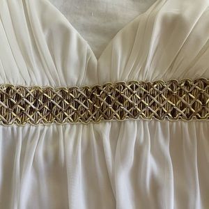 White used halter dress. Mid length.